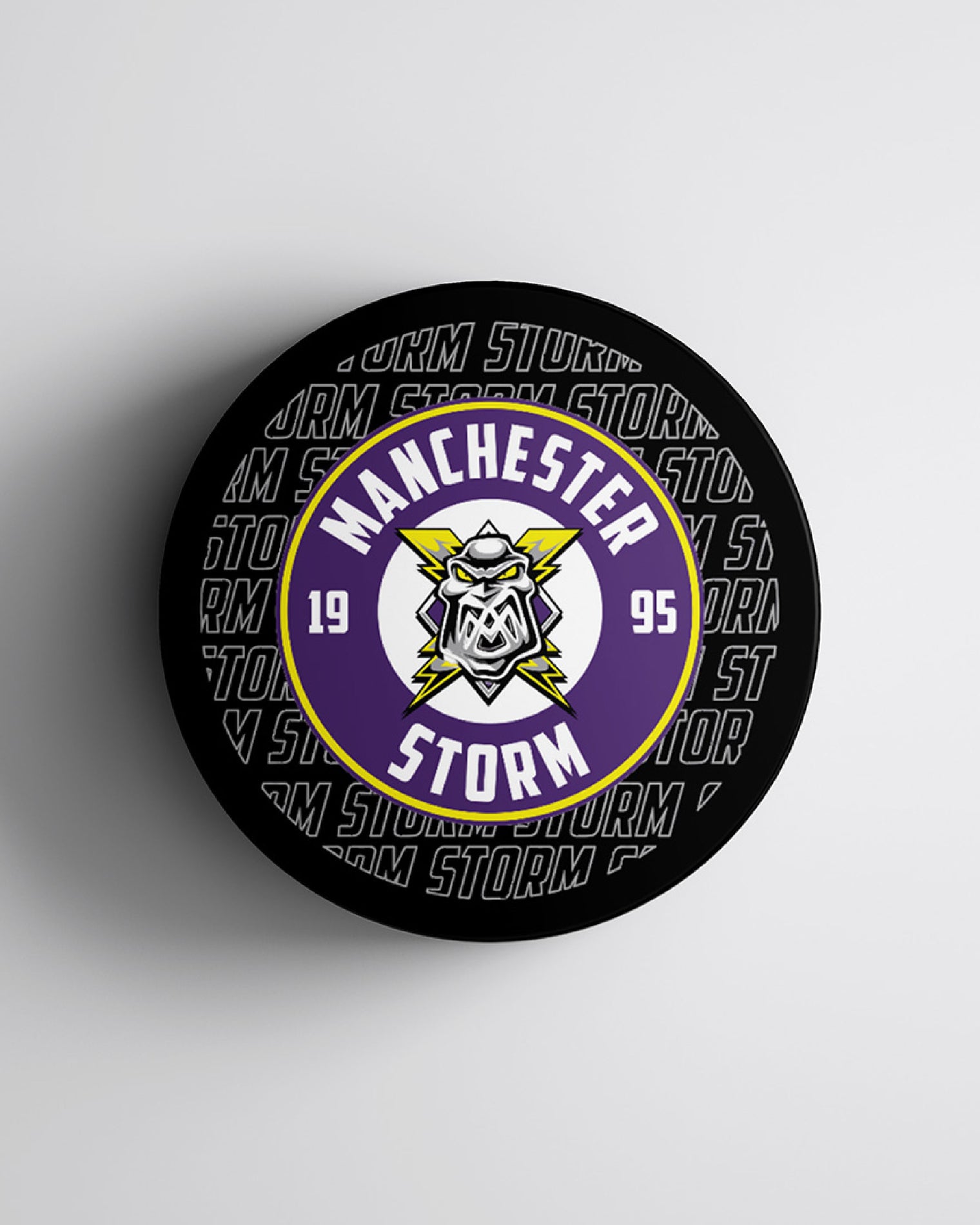 Manchester Storm 26-27 Black Logo Puck