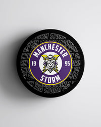 Manchester Storm 26-27 Black Logo Puck